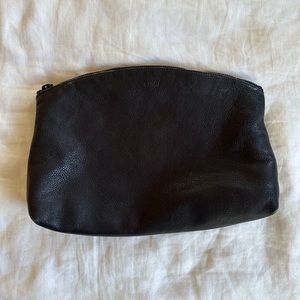 BAGGU black natural milled leather zipper pouch clutch. Great condition.